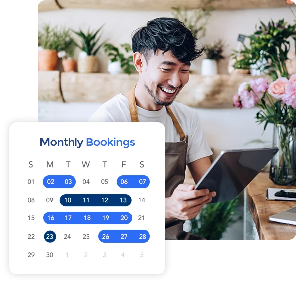 Man viewing bookings calendar tablet